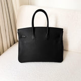 B35 - black togo (A stamp)