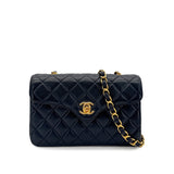 Vintage Navy Curved Mini Flap (Available at Ladybird)