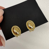 CD clip on earrings